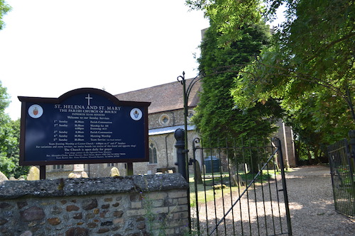 Sign and gates to church