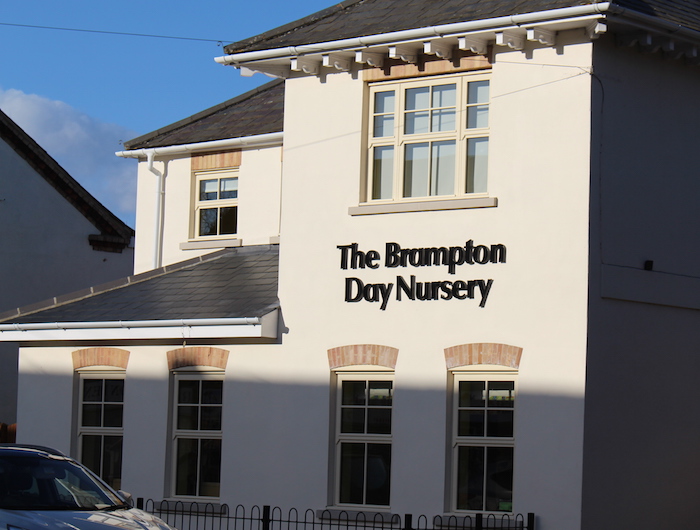 The Brampton Day Nursery with blue sky background