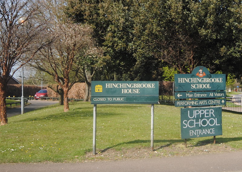 image of green sign to Hinchingbrooke school and hinchingbrooke house