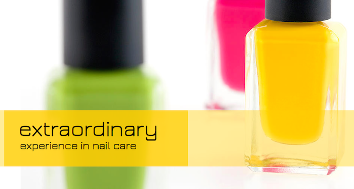 Three brightly coloured nail polish bottles