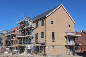 new three storey house in cambourne with scaffolding